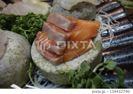 Sashimi on Stone Plate with Garnishes Sashimi on Stone Plate with Garnishes 139432790