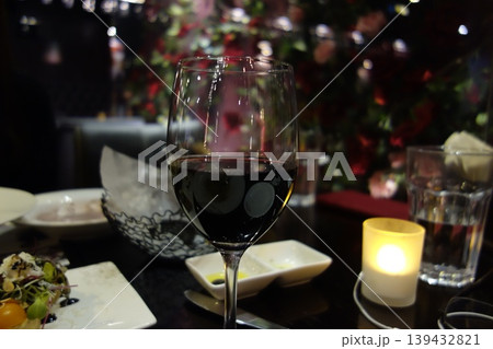 Romantic Dinner Setting with Wine Glass and Candle Romantic Dinner Setting with Wine Glass and Candle 139432821