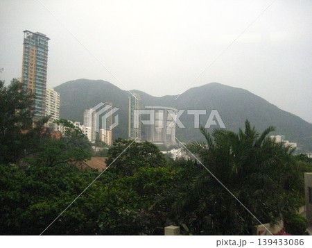 Urban Cityscape with Mountain Background 139433086