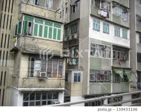 Old Urban Apartment Building Facade with Laundry Old Urban Apartment Building Facade with Laundry 139433106