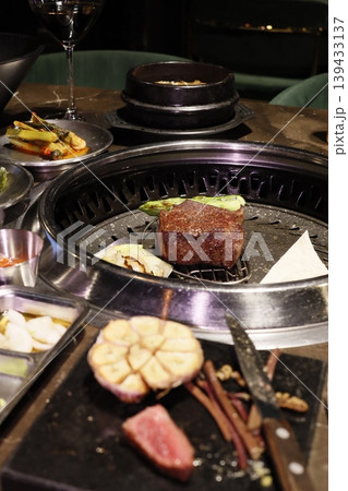Korean BBQ Grill with Grilled Meat and Vegetables Korean BBQ Grill with Grilled Meat and Vegetables 139433137