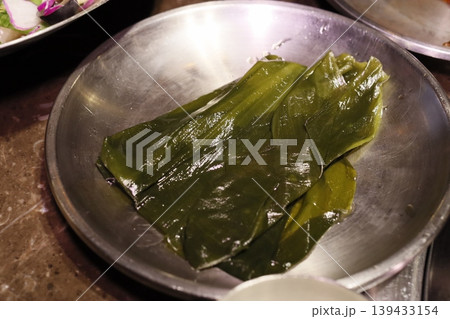 Fresh Green Leaves on Metal Tray Fresh Green Leaves on Metal Tray 139433154
