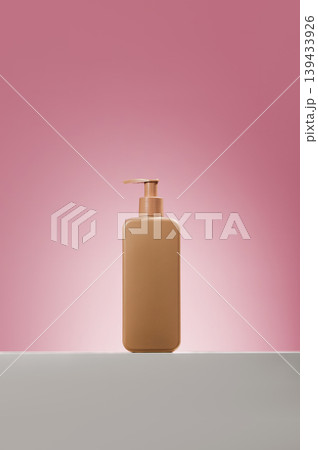 Beige moisturizer pump bottle on pink background Beige moisturizer pump bottle on pink background 139433926