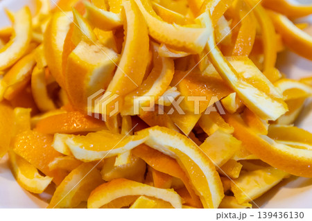 Top view of orange peels for candied fruit making Top view of orange peels for candied fruit making 139436130