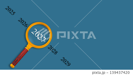 Vision 2027 concept with magnifying glass on blue background, looking into the future Vision 2027 concept with magnifying glass on blue background, looking into the future 139437420