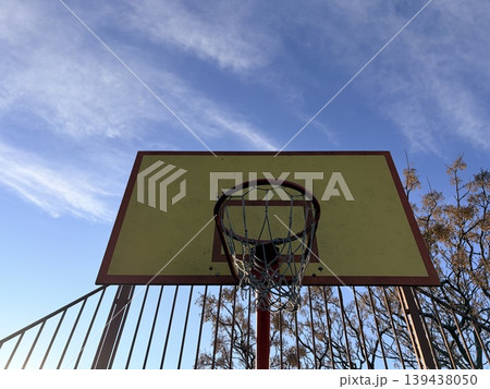 A photograph of a street basketball court. Streetball or street basketball. Active living and sports concept 139438050