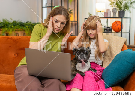 Mother daughter dog laptop error virus glitch restart fix upset tension support troubleshoot family Mother daughter dog laptop error virus glitch restart fix upset tension support troubleshoot family 139439695