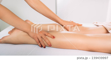 anti cellulite leg and foot massage. massage for slim leg and body 139439997