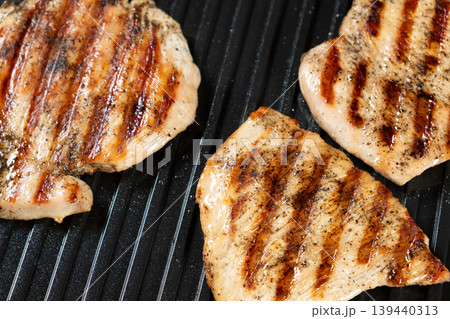 Grilled Turkey Steaks with Perfect Brown Grill Marks Close-up 139440313