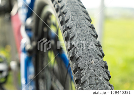 Detailed texture of damaged bicycle rubber tire. Detailed texture of damaged bicycle rubber tire. 139440381