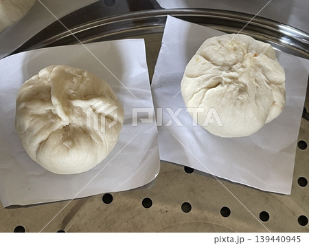 Two Raw Handmade Baozi Buns On Steamer Tray Ready For Cooking 139440945