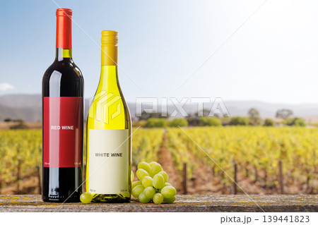 Red and white wine bottles with grapes Red and white wine bottles with grapes 139441823