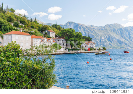 Cozy coastal town in Montenegro with traditional houses and sea view Cozy coastal town in Montenegro with traditional houses and sea view 139441924