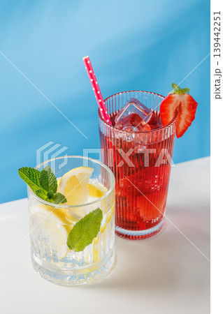 Fresh strawberry and lemon non alcoholic drinks with mint on blue background 139442251
