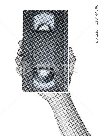 Hand holding a VHS video cassette isolated on transparent background with vintage newspaper print texture. Concept of retro media, analog video technology and nostalgic communication Hand holding a VHS video cassette isolated on transparent background with vintage newspaper print texture. Concept of retro media, analog video technology and nostalgic communication 139444506