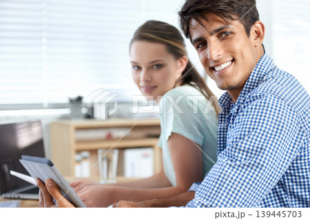 Colleagues, portrait and meeting with tablet, laptop and teamwork for digital planning. Man, woman and technology with email, working or project for conversation, workplace and professional 139445703