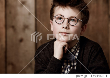 Face, smart and youth child thinking of prodigy development ideas, childhood plan or problem solving solution. Kid genius, planning decision and young boy question why, choice or remember memory 139446001