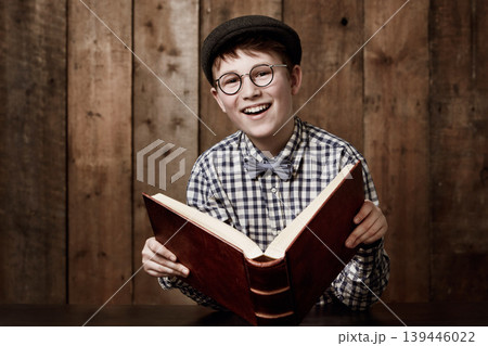 Learning portrait, book or young happy child, learner or pupil reading information, literature story or studying. Knowledge textbook, happiness or kid student education, literacy or research homework Learning portrait, book or young happy child, learner or pupil reading information, literature story or studying. Knowledge textbook, happiness or kid student education, literacy or research homework 139446022
