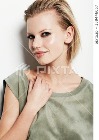 Portrait, woman and fashion with makeup in studio for trendy, modern or edgy style on white background. Swedish model person, confident and smile for cool clothes and glowing skin with cosmetics Portrait, woman and fashion with makeup in studio for trendy, modern or edgy style on white background. Swedish model person, confident and smile for cool clothes and glowing skin with cosmetics 139446057