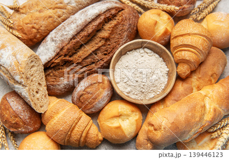 Freshly baked bread and pastries with baking flour 139446123