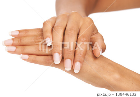 Woman, hand and nails in studio with manicure for cosmetics, skincare or nail treatment for wellness. Person, fingers or mock up space for cosmetology, moisturiser and smooth skin on white background Woman, hand and nails in studio with manicure for cosmetics, skincare or nail treatment for wellness. Person, fingers or mock up space for cosmetology, moisturiser and smooth skin on white background 139446132