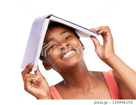 Portrait, knowledge and black girl with book on her head, education and balance isolated on a white studio background. Face, African person and model with mockup space and learning with student 139446159