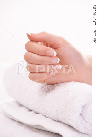 Woman, hand and french manicure for nails, polish and cosmetic care, skincare and beauty. Natural growth, wellness and treatment for hygiene, closeup and towel for girl, maintenance and parlour Woman, hand and french manicure for nails, polish and cosmetic care, skincare and beauty. Natural growth, wellness and treatment for hygiene, closeup and towel for girl, maintenance and parlour 139446285