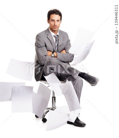 Portrait, arms crossed or business man with paperwork isolated on white studio background. Documents in air, serious professional or calm in stress on chair, confident corporate accountant or auditor 139446311