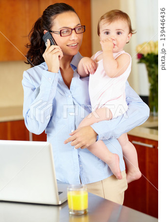 Mother, baby and phone call for home planning, career management and laptop in kitchen for multitasking. Single mom or freelancer on mobile and computer for job search, chat and financial opportunity Mother, baby and phone call for home planning, career management and laptop in kitchen for multitasking. Single mom or freelancer on mobile and computer for job search, chat and financial opportunity 139446436