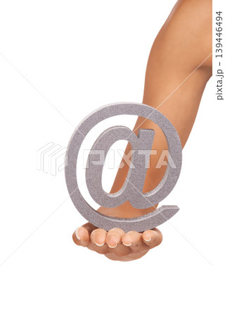 Hands, @ sign and closeup on a white background in studio isolated on mockup or copy space. Fingers, palm and at symbol, font and letter, character and icon for address, social media and alphabet Hands, @ sign and closeup on a white background in studio isolated on mockup or copy space. Fingers, palm and at symbol, font and letter, character and icon for address, social media and alphabet 139446494