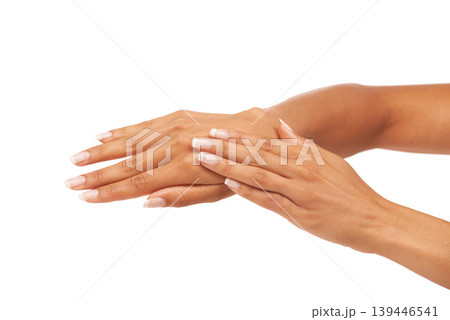 Woman, hands or nails in studio with manicure for cosmetics, skincare or nail treatment for wellness. Person, fingers or mock up space for cosmetology, moisturiser and smooth skin on white background 139446541