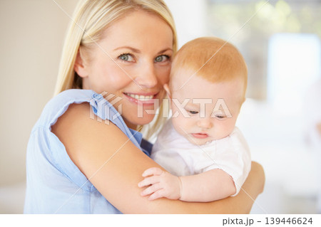 Portrait, happiness and home mother, baby or family for newborn child growth, youth development or wellness. Happy face, smile and mom holding, hug or embrace kid for bonding, nurture or love 139446624