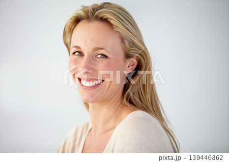 Portrait, smile and mature woman in studio with confident personality isolated on white background. Face of beautiful blond model in good mood, pride and happy to relax for optimism in New Zealand 139446862