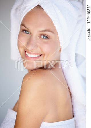 Portrait of happy woman, natural beauty or towel for wellness in house bathroom for glow. Morning, detox or confident female model with skincare results, self care or healthy skin for dermatology Portrait of happy woman, natural beauty or towel for wellness in house bathroom for glow. Morning, detox or confident female model with skincare results, self care or healthy skin for dermatology 139446875