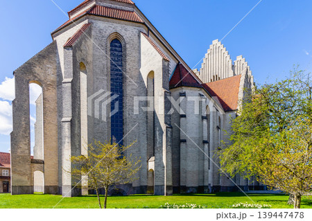 Grundtvig Church exterior with vertical windows and tiled roof in Copenhagen Denmark. Grundtvig Church exterior with vertical windows and tiled roof in Copenhagen Denmark. 139447478