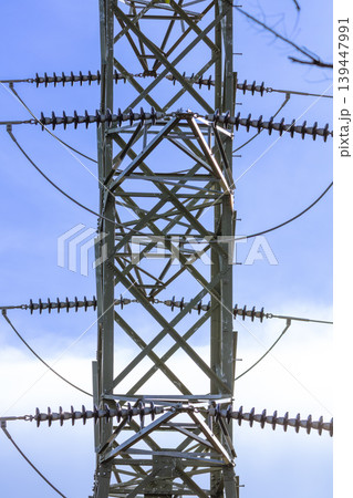 A close up view of the steelwork on an electrical transmission tower A close up view of the steelwork on an electrical transmission tower 139447991