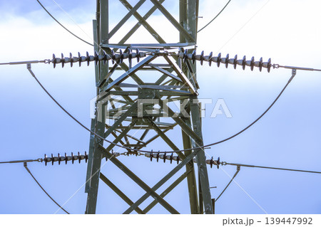 A close up view of the steelwork on an electrical transmission tower A close up view of the steelwork on an electrical transmission tower 139447992