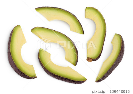 avocado pieces isolated on white background close up. Top view. Flat lay 139448016
