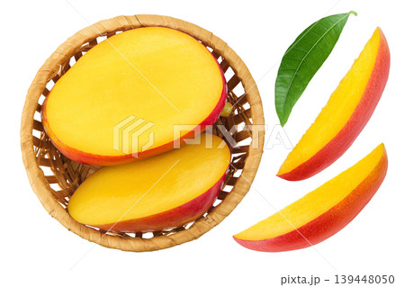 mango half in a wicker basket isolated on white background. Top view, flat lay mango half in a wicker basket isolated on white background. Top view, flat lay 139448050