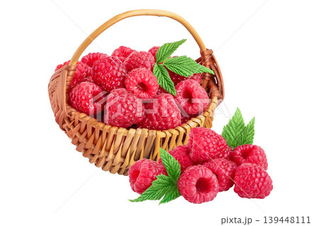 Ripe raspberries with leaf in a wicker basket isolated on white background Ripe raspberries with leaf in a wicker basket isolated on white background 139448111