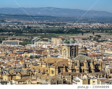 Historic Granada Cathedral and Sunlit Spanish Cityscape With Tiled Rooftops viewed from Alhambra Historic Granada Cathedral and Sunlit Spanish Cityscape With Tiled Rooftops viewed from Alhambra 139448699