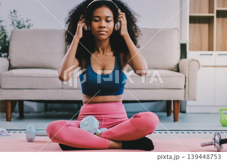 Women exercising in fitness studio yoga classes Women exercising in fitness studio yoga classes 139448753