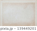 Old paper texture with stains, faded border, grain, blank center for stationery, archive, scrapbook, design. Natural background paper for mockup, copy space, banner, invitation, branding 139449201