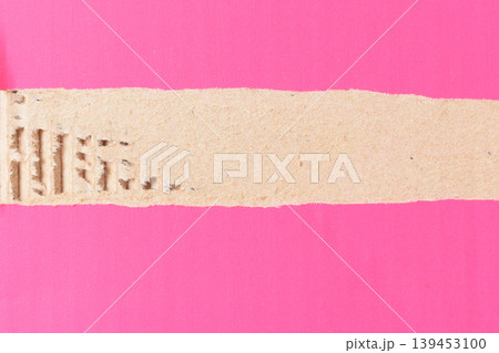 tear pink cardboard box texture background, recycle material 139453100