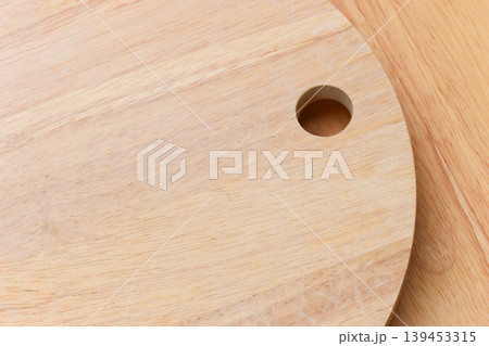 brown wooden sphere cuttingboard wood background 139453315