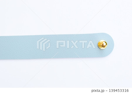 light blue leather strap isolated on white background light blue leather strap isolated on white background 139453316