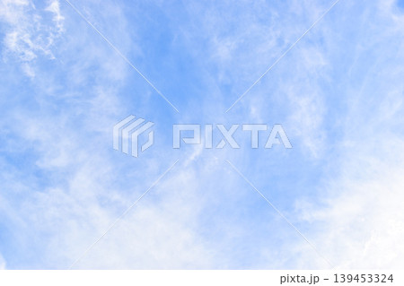beautiful blue sky and white fluffy group of clouds with sunrise in the morning, natural background 139453324
