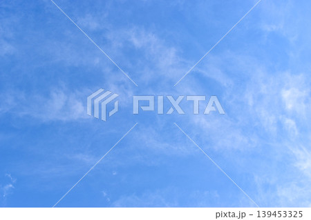 beautiful blue sky and white fluffy group of clouds with sunrise in the morning, natural background beautiful blue sky and white fluffy group of clouds with sunrise in the morning, natural background 139453325