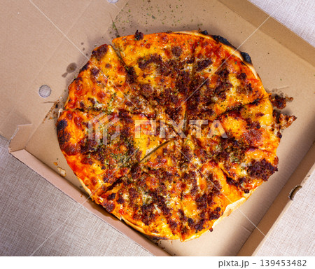 Freshly baked pizza with minced meat. Homemade food, traditional recipe 139453482