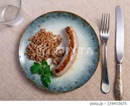 Fried pork or chicken homemade sausage and porridge buckwheat Fried pork or chicken homemade sausage and porridge buckwheat 139453675